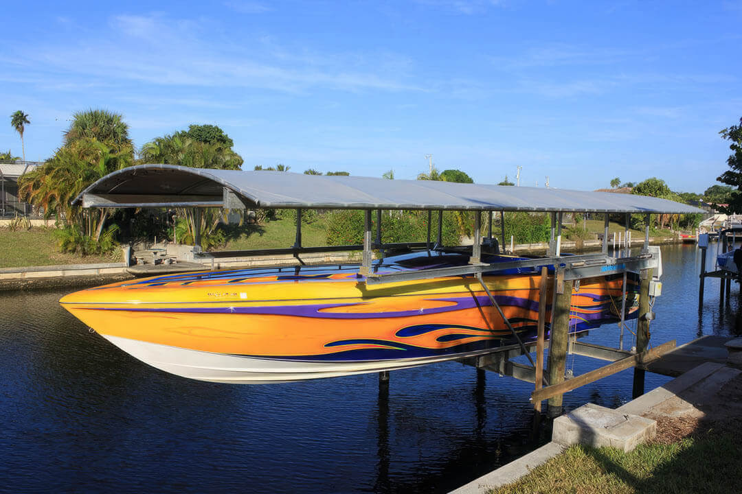 4-Pile Boat Lift with a 13K Boat Centered on the Lift - BOAT LIFT US